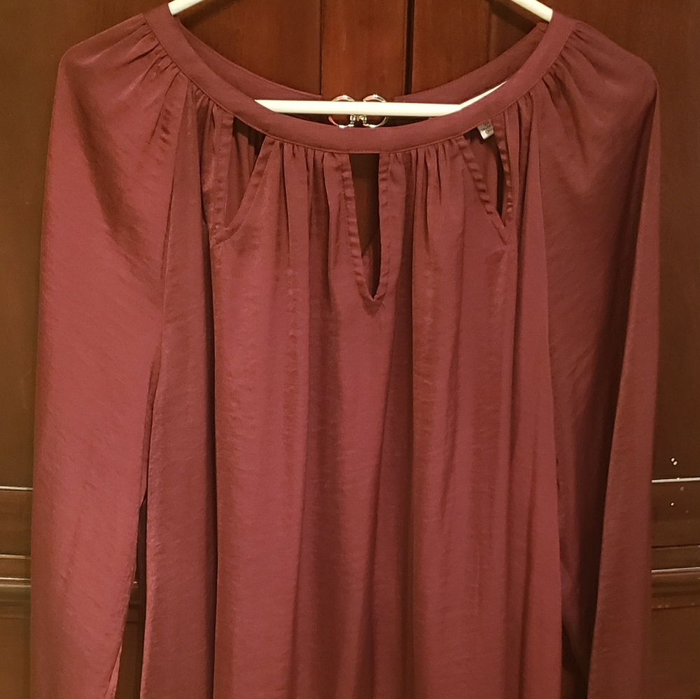 Wine colored, long sleeve sexy shirt JLo.